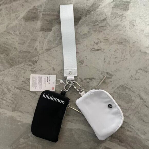 Brand new with tags Lululemon dual pouch keychain - Picture 1 of 1